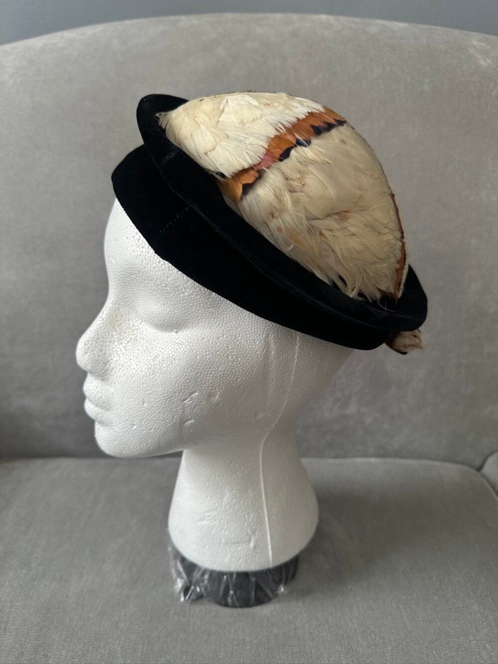 Vintage 1940s women's feathered hat with black velvet base